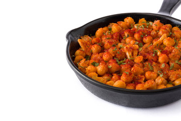 Fried spicy chickpeas in frying pan isolated on white background