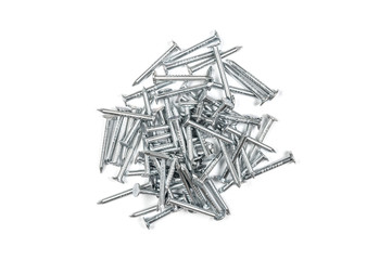 Pile of metal nails on white background