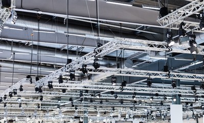 Steel truss holding lights in a big hall