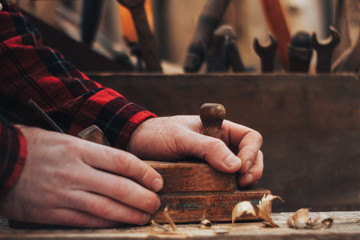 people handles a wooden Board