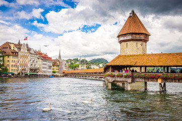 City center with famous Chapel Bridge and lake in Lucerne, Switzerland