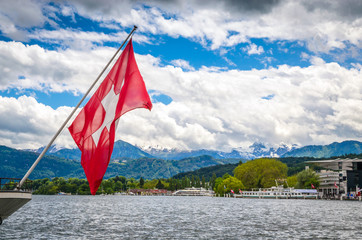 View of Lake Lucerne in summer season with swiss flag, Switzerland