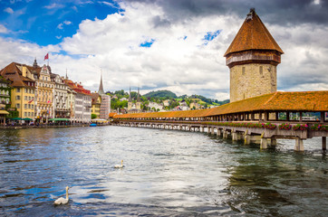 City center with famous Chapel Bridge and lake in Lucerne, Switzerland