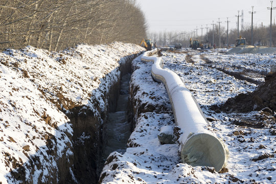 New Pipeline Of Propylene DN 350 Near The Trench In Winter 