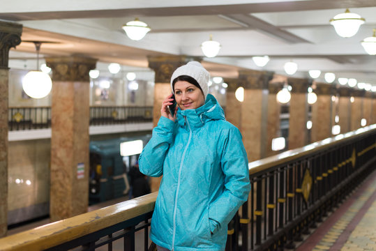 Woman Talking On Phone In Moscow Metro In Russia