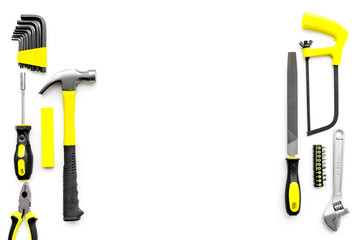 Various repair tools. Must-have for men. Equipment for building. White background top view copy space pattern