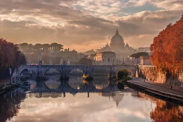 Fotobehang Autumn sunset in Rome long River Tiber with Saint Peter dome and Sant'Angelo Bridge © crisfotolux