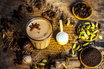Brown mustard seeds,mustard seed's oil/Tea and crushed mustard seeds on the brown wooden...