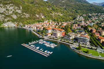 Fototapeta na wymiar Porlezza (IT) - Vista aerea dal Lago di Lugano verso Menaggio