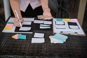 user experience, UX designer designing web on smartphone layout. UI planning mobile application....