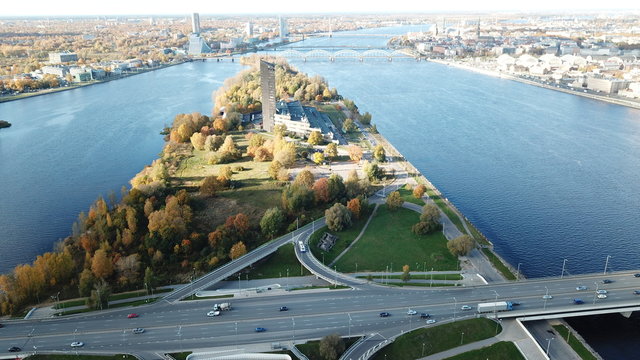 Cars on river Daugava bridge Riga Latvia aerial drone top view