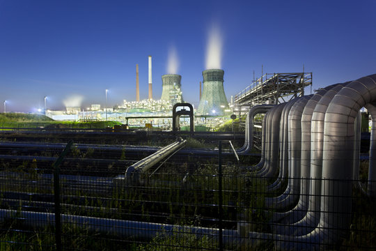 Refinery And Pipelines At Night