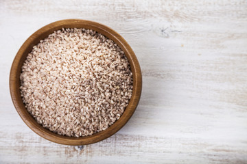 Raw pink rice in a bowl