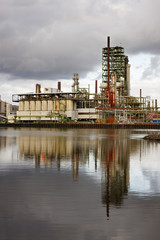 Fototapeta na wymiar Oil Refinery At Canal