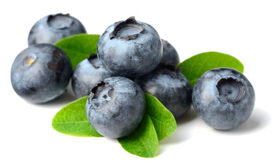 fresh blueberries with green leaves isolated on the white background
