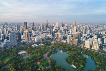 Fototapeta premium Modern city downtown of Bangkok with green public park