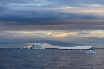 Antarctic landscape with sea and mountains