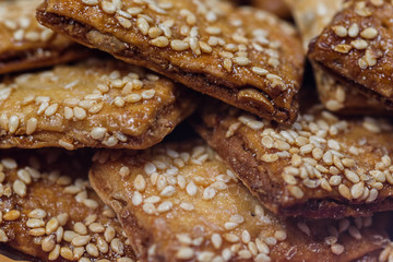 biscuits with sesame seeds and small bagels photographed macro