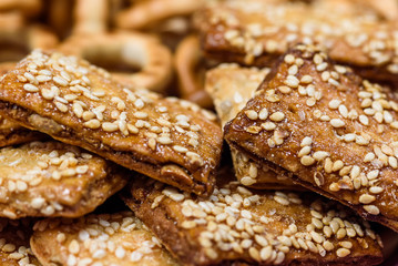 biscuits with sesame seeds and small bagels photographed macro