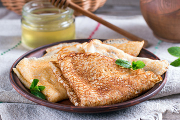 Russian traditional pancakes on milk with yeast