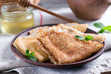 Russian traditional pancakes on milk with yeast