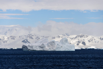Antarctic landscape with sea and mountains