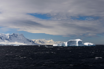 Antarctic landscape with iceberg
