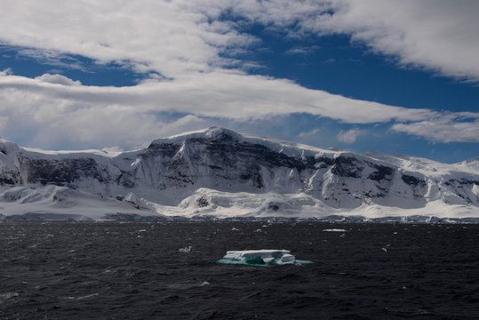 Antarctic landscape with iceberg