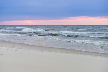 Sea and beach during cloudy day