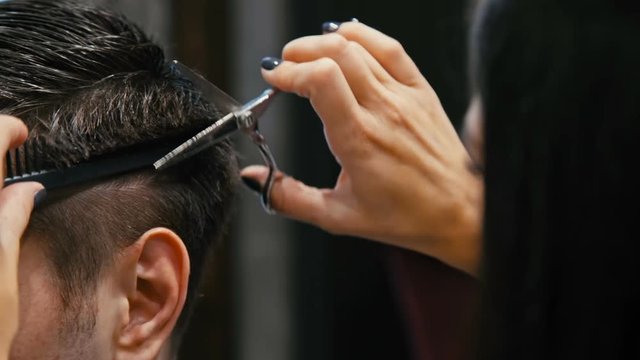 the man is cut in a hairdresser's