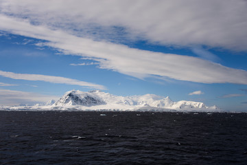 Antarctic landscape with iceberg