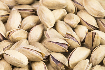 Green fresh pistachios as texture. 