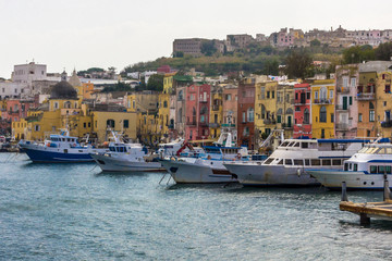Fototapeta na wymiar Procida Island with colorful houses on Neapolitan Bay in Italy