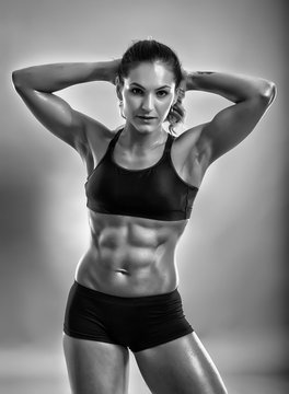 Fitness woman posing in studio