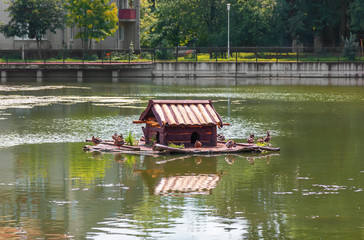 Duck house on a pond. Kaliningrad. Russia.