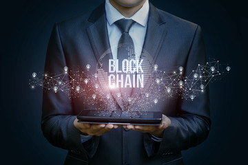 Businessman in the network shows the block chain .