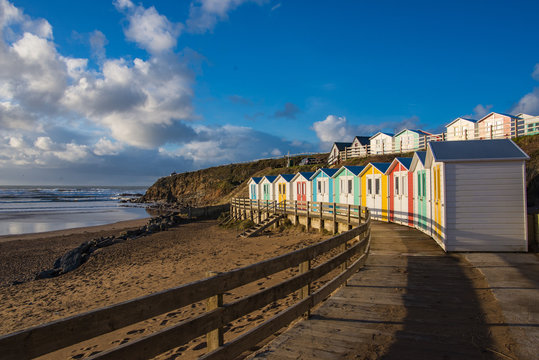 Beach huts over Summerleaze beach in Bude, Cornwall