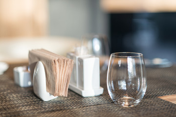 Table setting, interior elements and  silverware in japanese restaurant for sushi