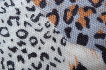 motley colored fabric scarf dress close-up background for design background textile cloth clothes vintage natural fabric flax cotton wool abstract illustration white-black leopard print drawing