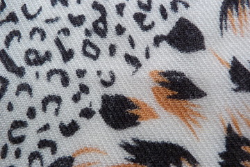 motley colored fabric scarf dress close-up background for design background textile cloth clothes vintage natural fabric flax cotton wool abstract illustration white-black leopard print drawing