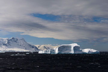 Antarctic landscape with iceberg