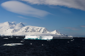 Antarctic landscape with iceberg