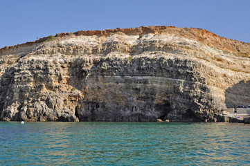 Rocks, sea and island of Gozo and Malta
