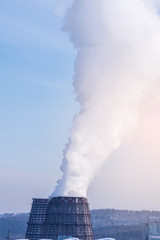 Smoking pipes of thermal power plant emitting carbon dioxide in the atmosphere. Concept of environmental pollution