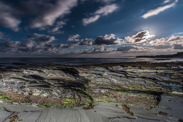 The full moon offers multiple scenes worthy of photographing, on the beach, on the mountain, in the city, with and without clouds, etc in the evenings of Galicia, Spain.