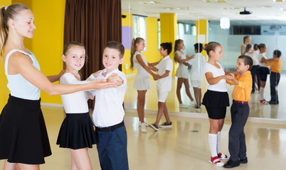 Fototapeta premium Children enjoying of partner dance