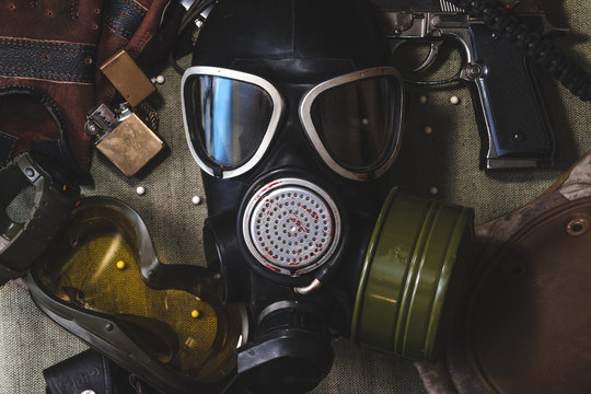 airsoft rifle balls and gun, goggles, gas mask, outfit, millitary game, top view