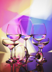 Glass glasses of different shapes in bright colors