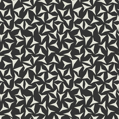 Abstract background, seamless texture. Soft tone beige colous triangles on brown black background.
