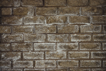 Brick snowcapped wall